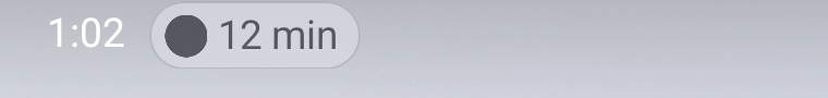 Android status-bar chip: icon + 12 min pill